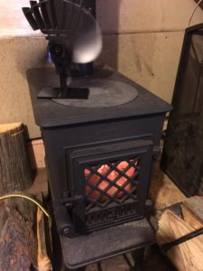 A kitchen bright spot, my jotul stove with a cooktop, and my non-electric eco fan